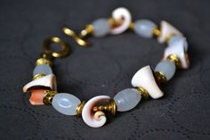 Gold and Coral Shell Bracelet by grillo06 on Etsy Grasshopper Jewelry, Jewelry Bracelets, Shells, Coral, Beaded Bracelets, Handmade Gift, Bracelet, Trending Outfits