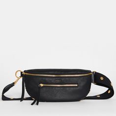 This updated take on our internet famous belt bag embraces the crossbody styling our fans have come to love, with size inclusivity in mind. Plus, its long strap allows you to truly wear this style as a low slung crossbody, in addition to over your chest. Our classic black pebbled leather paired with our brushed gold hardware including our signature rivets on the webbing strap. Crafted with soft black pebbled leather Red cotton twill lining Brushed gold hardware, covered for life Front zippered p Size Inclusivity, Hammitt Handbags, Brushed Gold Hardware, 2024 Wishlist, Internet Famous, J Cole, Webbing Strap, Black Pebbles, Soft Black