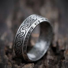 Show your love of Norse mythology with this stainless steel Viking Runes ring. Featuring a stylish, modern design and large engraving of ancient runes, this ring is a must for those who want to pay tribute to their Viking heritage. - 3 Colors availableThis Viking Runes ring is perfect for anyone looking to customize their look with a trendy and high quality ring. Made from premium-quality stainless steel, this gorgeous ring will never tarnish or oxidize thanks to its ridiculous sturdy nature. It Norse Wedding, Viking Heritage, Nordic Symbols, Iron Necklace, Teen Ring, Viking Rings, Ancient Runes, Nordic Runes, Mjolnir Pendant