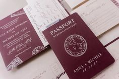 two passport cards sitting on top of each other