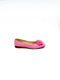 Vintage 1960s vegan pink fabric rosette flats by Gaymode for JC Penney. Features bright pink fabric uppers, wide rounded toe, fabric rosette detail at vamp, slip on style, and barely-there heel. Includes original shoebox. Very good vintage condition with some light color fading. Heel to toe (inside shoe): 10 inches Ball of foot (bottom of sole): 3.125 inches Heel height: <1 inch Size 8 Pink Slip-on Ballet Flats For Summer, Spring Pink Ballet Flats With Flat Heel, Pink Ballet Flats For Spring, Pink Spring Ballet Flats, Pink Slip-on Ballet Flats For Spring, Pink Closed Toe Ballet Flats For Spring, Pink Feminine Ballet Flats For Spring, Spring Pink Closed Toe Ballet Flats, Feminine Pink Ballet Flats For Spring