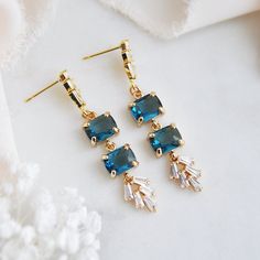 "Blue Wedding Earrings // Something Blue // Art Deco Earrings // Boho Bridal Earrings // Geometric Earrings // Summer Earrings // Bridesmaids Gift Beautiful blue wedding earrings created with faceted blue glass and accented with cubic zirconia for added sparkle. These art deco earrings are created with gold plated sterling silver earring posts and gold plated butterfly clutches. Whether searching for the perfect blue earrings for your bridesmaids or for your next special ocassion, all of my jewe Blue Wedding Earrings, Boho Bridal Earrings, Blue Earrings Wedding, Blue Statement Earrings, Blue Art Deco, Deco Earrings, Perfect Blue, Earrings Summer, Summer Earrings