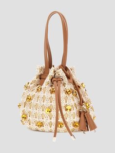 Metallic canvas bucket bag Woven crochet overlay with jewel embellishments Faux-leather trim Shiny gold-tone hardware Removable tab keychain included Signature monogram-printed lining Drawstring closure Top handles Luxury Bucket Bag With Gold-tone Hardware For Summer, Luxury Summer Bucket Bag With Gold-tone Hardware, Evening Beige Bucket Bag With Braided Handles, Luxury Gold Bucket Bag For Shopping, Elegant Gold Bucket Bag With Handles, Gold Bucket Bag With Gold-tone Hardware, Summer Embellished Beige Bags, Gold Top Handle Bucket Bag For Shopping, Luxury Summer Fashion Bags