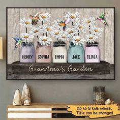 three mason jars with daisies in them and the words grandma's garden on it