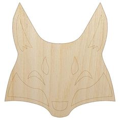 a wooden cutout of a fox's head