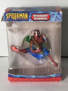 the action figure spiderman is in its box