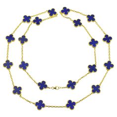 VCA Lapis Lazuli Vintage Alhambra Necklace in 18k yellow gold. The necklace features 20 lapis lazuli clover motifs. Equipped with lobster clasp. Inscribed: VCA 750, 4K629.132. Stamped with french hallmarks and makers marks. Motif measurements: 15mm. Accompanied by VCA valuation report and necklace pouch Length: 33 inches. . Vintage Alhambra Necklace, Necklace Pouch, Alhambra Necklace, Van Cleef Arpels, Makers Mark, Lapis Lazuli, Chains Necklace, The Necklace, Lobster Clasp