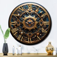 a gold and black clock sitting on top of a wooden table next to vases