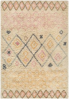 an area rug with various colors and patterns on it, including pink, yellow, blue,