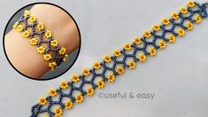 a bracelet with yellow flowers on it and a black beaded chain attached to the wrist