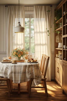 a dining room with a table and chairs in front of a window that has sun shining through the curtains