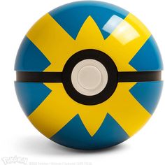 a blue and yellow ball with a black center on it's side, sitting in front of a white background