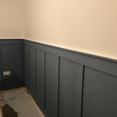 the walls are painted blue and there is no one on it in the room that needs to be finished