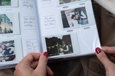 two hands holding an open book with pictures on it and the pages are lined up