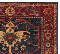 a blue and red rug with an ornate design