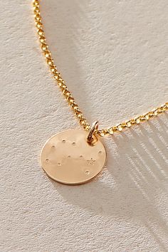 Add a personalized touch to your everyday jewelry with this cool constellation necklace featuring a durable 14k gold-filled design and hand-stamped detailing with a classic linked chain and lobster clasp closure. **Features:** Gold-filled sterling silver, hypoallergenic, durable design, disc-shaped pendant with constellation design, hand-stamped detail, classic chain with lobster clasp closure, fixed length **Why We ❤ It:** This dainty necklace makes for a great gift! | OXB Sweatproof Constellat Scorpio Color, Constellation Design, Gemini And Sagittarius, Pisces And Capricorn, Scorpio Necklace, Gemini And Virgo, Fringed Belt, Talisman Necklace, Trending Necklaces