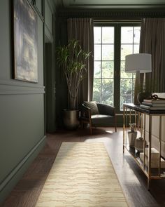 a living room filled with furniture and a large window