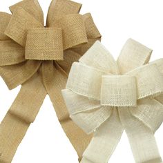 two bows are shown side by side, one is beige and the other is white