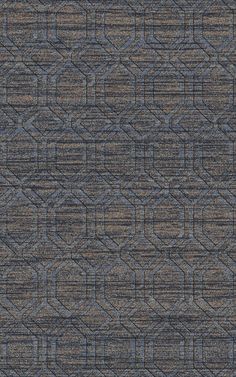 a blue and brown area rug with an abstract design on the bottom half of it