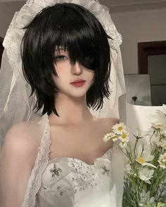 a woman with black hair wearing a wedding dress