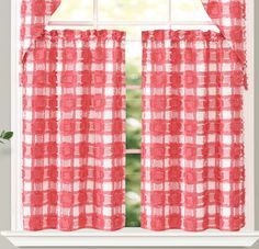 a red and white checkered window curtain