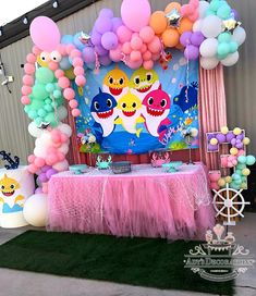 a birthday party with balloons and decorations