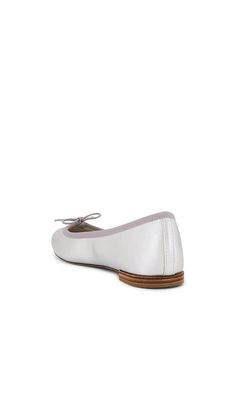 Find REPETTO Cendrillon Ballerinas In Metallic Silver on Editorialist. Repetto Cendrillon Ballerinas in Metallic Silver. - size 36 (also in 37, 38, 39, 40) Repetto Cendrillon Ballerinas in Metallic Silver. - size 36 (also in 37, 38, 39, 40) Metallic lambskin upper with leather sole. Made in France. Slip-on styling. Bow detail at upper. Leather and canvas lining. Round toe. RPPO-WZ6. V086AGM. After outfitting generations of prima ballerinas since 1947, French shoe company Repetto is keeping fashi Formal Ballet Flats, Elegant Ballet Flats With Round Toe, Elegant Fitted Ballet Flats With Round Toe, Repetto Flats, French Shoes, Metallic Flats, Leather And Canvas, Pink Ballerina, Shoe Company