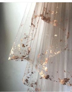 the curtain is covered with dirt and water