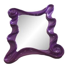 a purple mirror with wavy design on it