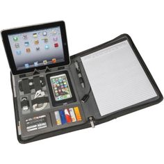 an ipad case is open and has various items inside it, including pens, pencils, and other office supplies