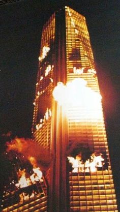 a very tall building lit up at night