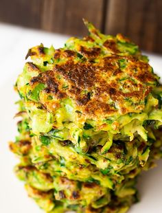 a stack of food sitting on top of a white plate