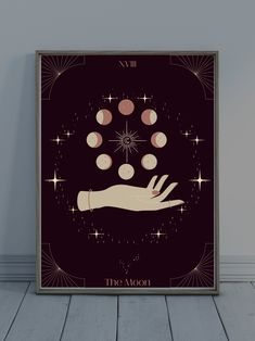 an art deco poster with the moon and stars on it's side, in front of a wooden floor