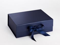 a blue box with a bow on it