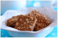 two pieces of granola in a white bowl