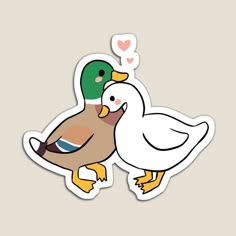 two ducks are standing next to each other on a sticker that says i love you