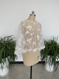 Color: white, ivory Size: One size fits all Exact Material:lace Brand: New never been used no label Transportation time in Europe and America: 10-18 working days, Other countries: 10-25 working days White Lace With Long Sleeve Patchwork, White Lace With Long Sleeves And Patchwork, White Lace Top For Party, Delicate Lace Top For Wedding Night, White Scalloped Lace Dress For Wedding Night, White Lace Party Top, Wedding Lace Top With Sleeves For Spring, White Delicate Lace Top For Party, White Fitted Lace Top With Lace Sleeves