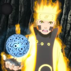 a man holding a ball in his hand with fire coming out of the back ground