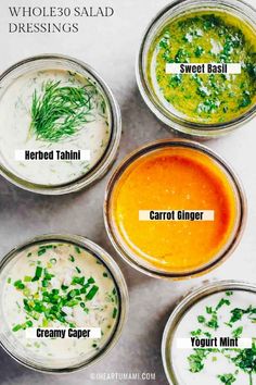 four different types of sauces in small glass bowls on a white surface with the words,