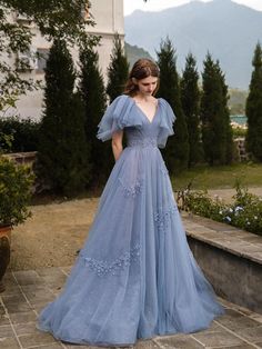 Light Blue V-neck Dress For Banquet, Blue V-neck Dress For Banquet, Blue Tulle Dress With Short Sleeves, Blue V-neck Gown For Prom Season, Light Blue V-neck Gown For Prom, Blue V-neck Gown For Wedding, Blue Tulle Dress For Formal Occasions, Formal Blue Tulle Dress, Blue Short Sleeve Prom Gown