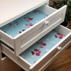 two drawers are open on top of each other