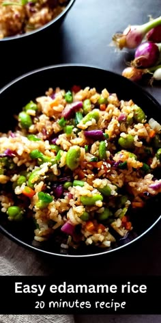 a bowl filled with rice and vegetables on top of a table