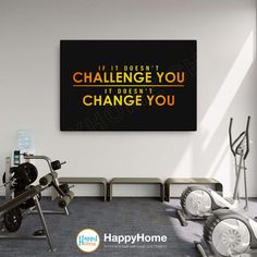 there is a gym with exercise equipment on the floor and a sign that says if it doesn't challenge you, it doesn't doesn't change you