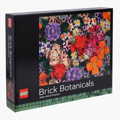 the lego brick botanicals book is open to show flowers and plants in different colors