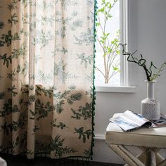 the curtains in this room are drawn up to look like they have flowers on them