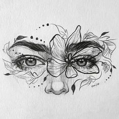 a drawing of a woman's face with flowers and leaves around her eyes on paper