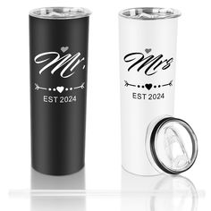 two black and white tumblers with the names mr and mrs printed on each one