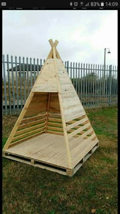 a wooden structure made to look like a teepee