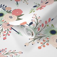 a floral wallpaper with pink, blue and green flowers