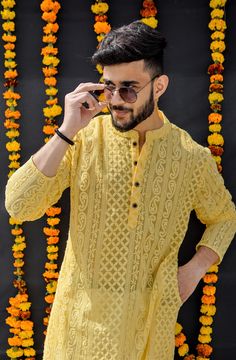 MEN CHIKANKARI KURTA FEATURING : Daksh TripathiFABRIC : Cotton GeorgetteCOLOR : Summer YellowLENGTH : Long Kurta - Knee LengthFIT TYPE : Regular FitPATTERN/DESIGN : Intricate Paisley EmbroideryCOLLAR TYPE : Mandarin CollarSLEEVES : Full SleevesPACKAGE CONTENTS : 1 Piece - One Kurta OnlyWASH CARE - Wash Separately In Co Yellow Kurta Men For Haldi, Haldi Photoshoot, Lucknowi Kurta, Kurta Pajama Men, Haldi Outfits